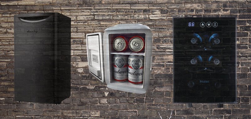 Three mini fridges on brick background