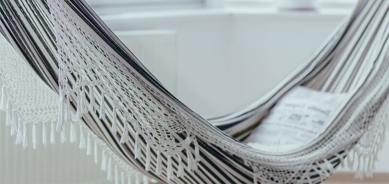 White and black hammock indoors